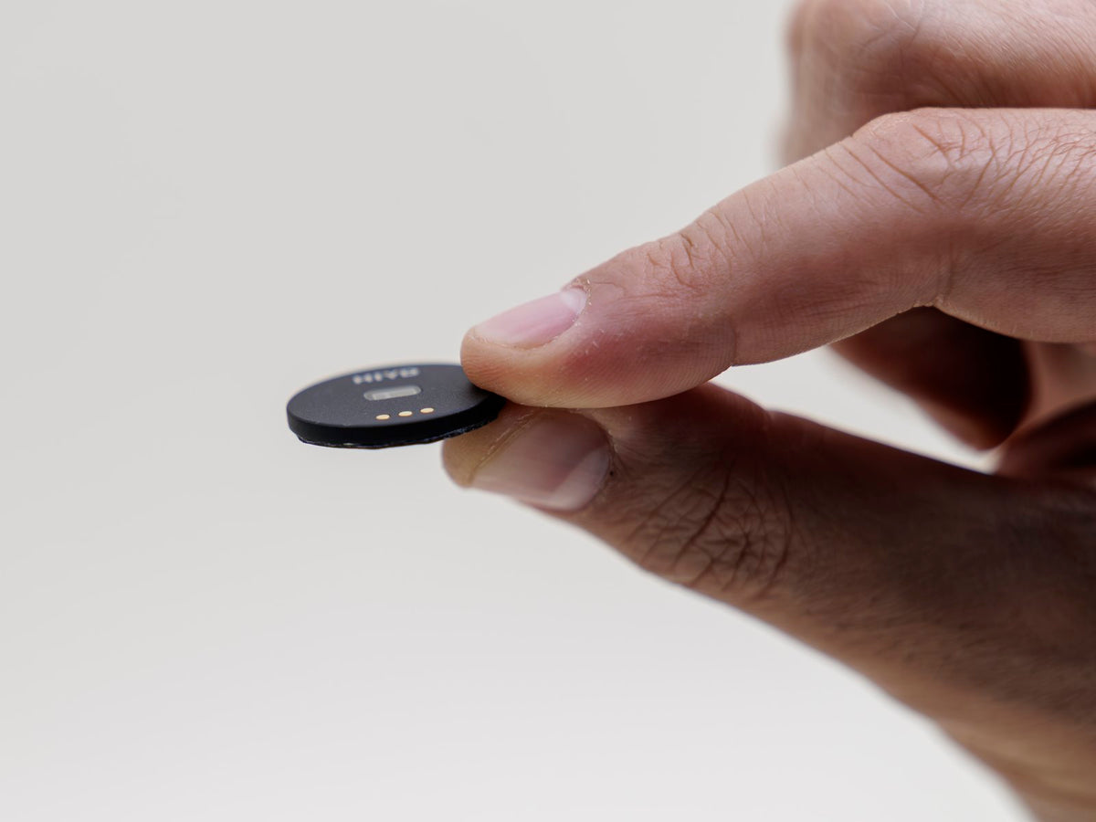 The HIYD sensor held edge-on between fingertips