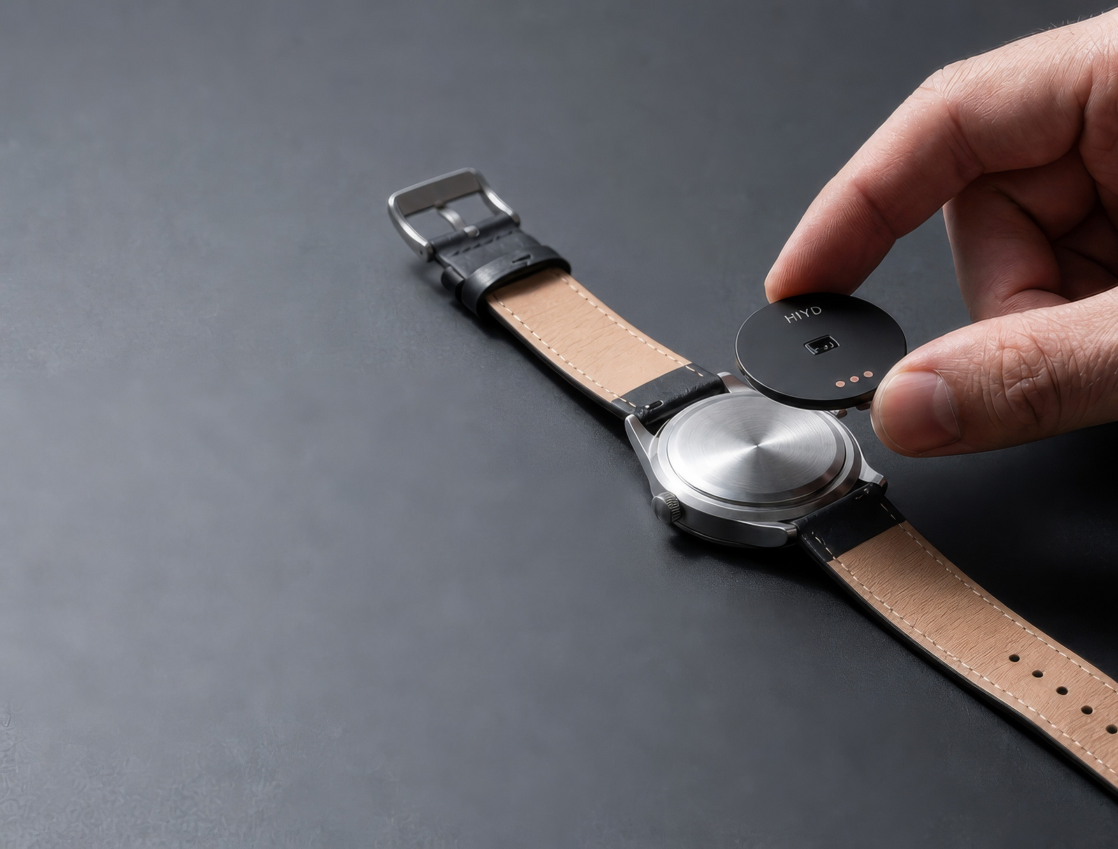3D mock-up of Hiyd rotating behind a watch case-back.